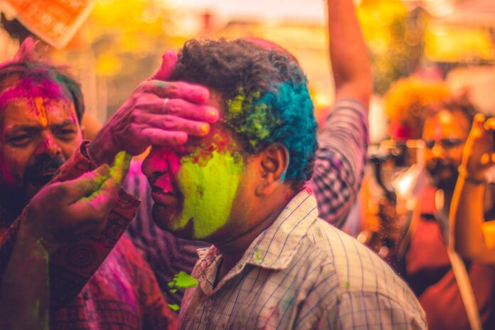 people playing holi colour festival